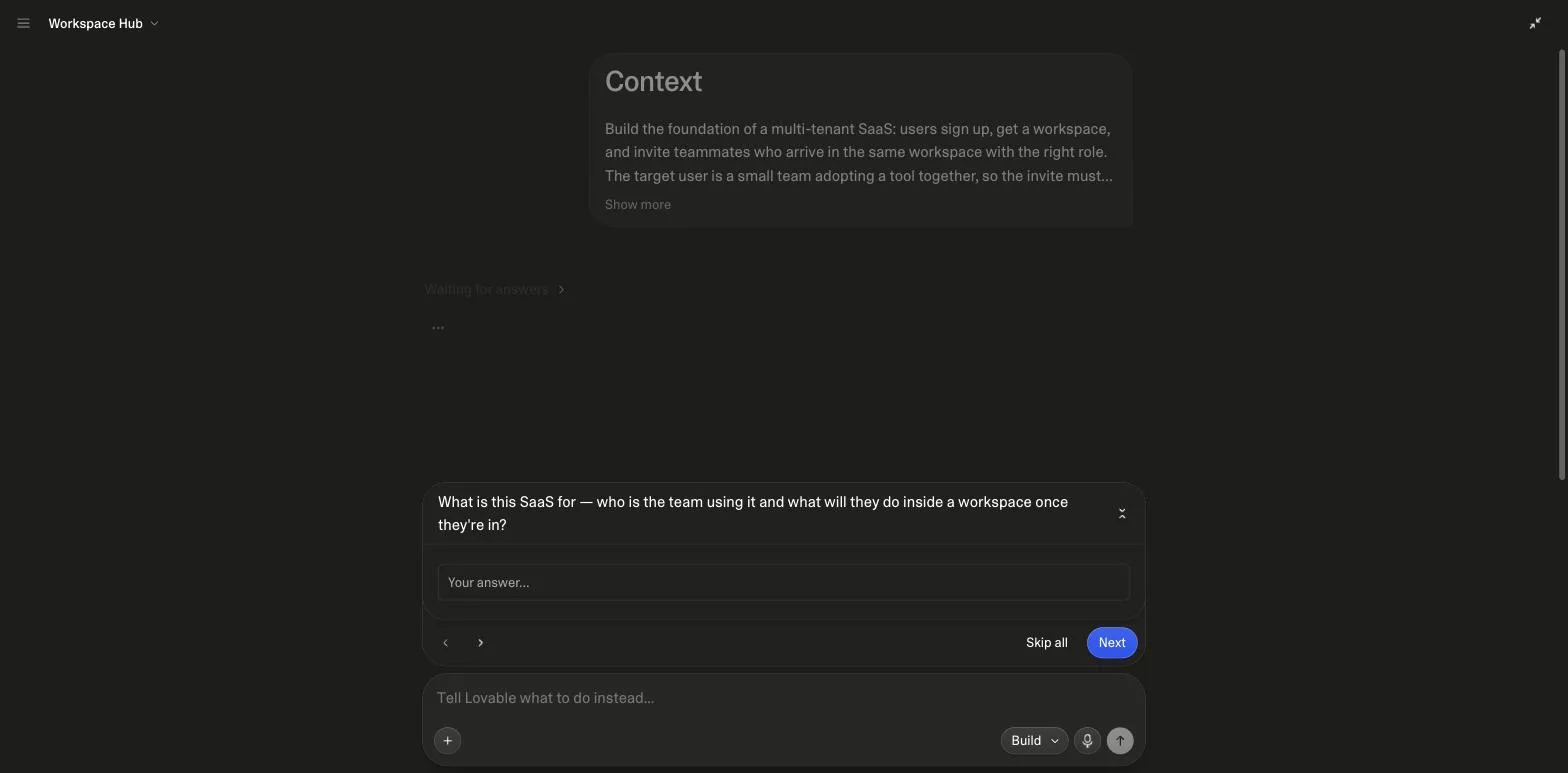 Lovable's chat before building the SaaS prompt: a question card asking what the SaaS is for and who the team using it is, with answer options and a free-text field